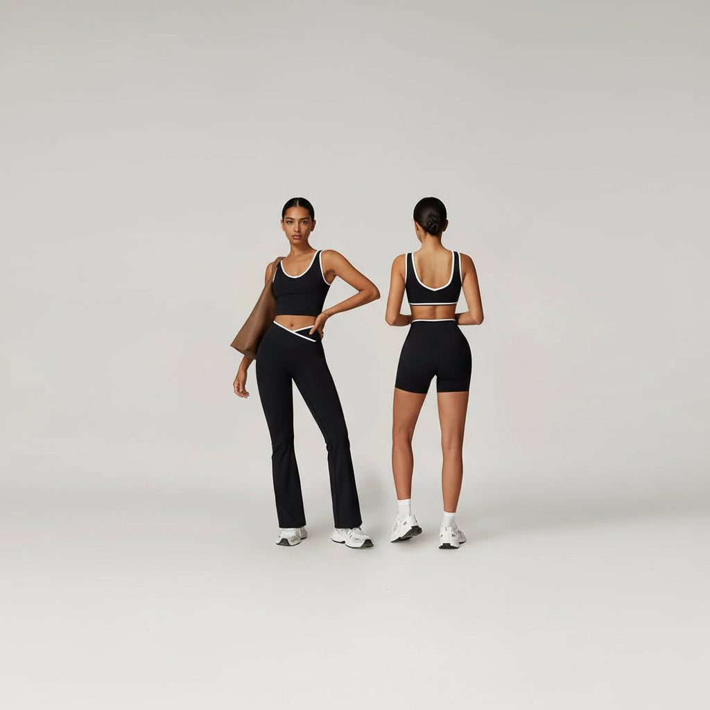 Two views of a person wearing black athletic pants and a sports bra on a plain background make sure I can see this full set 
